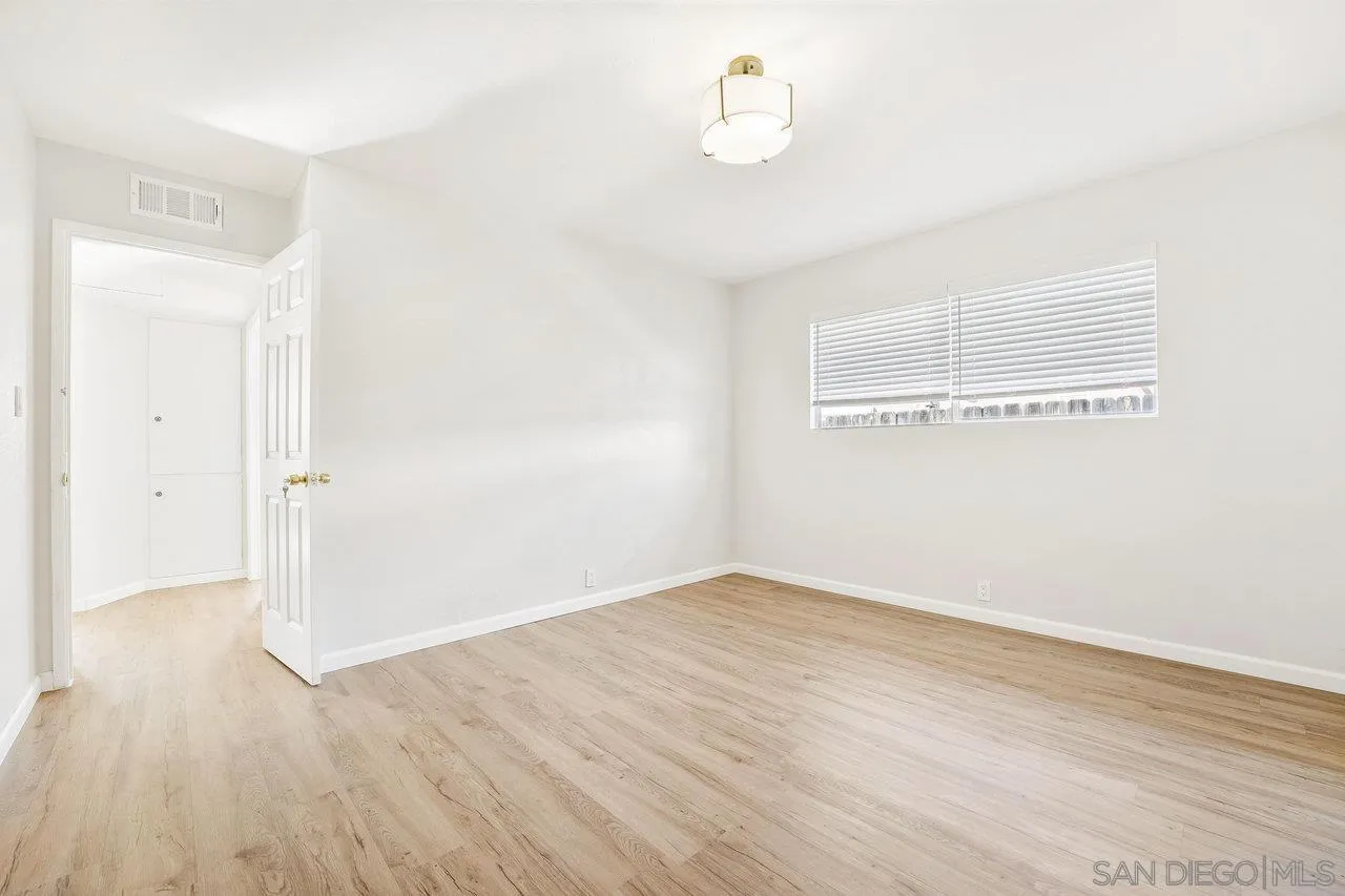 1355 Bluebell Way El Cajon, CA 92021 - Photo 25 of 33 a view of empty room with wooden floor