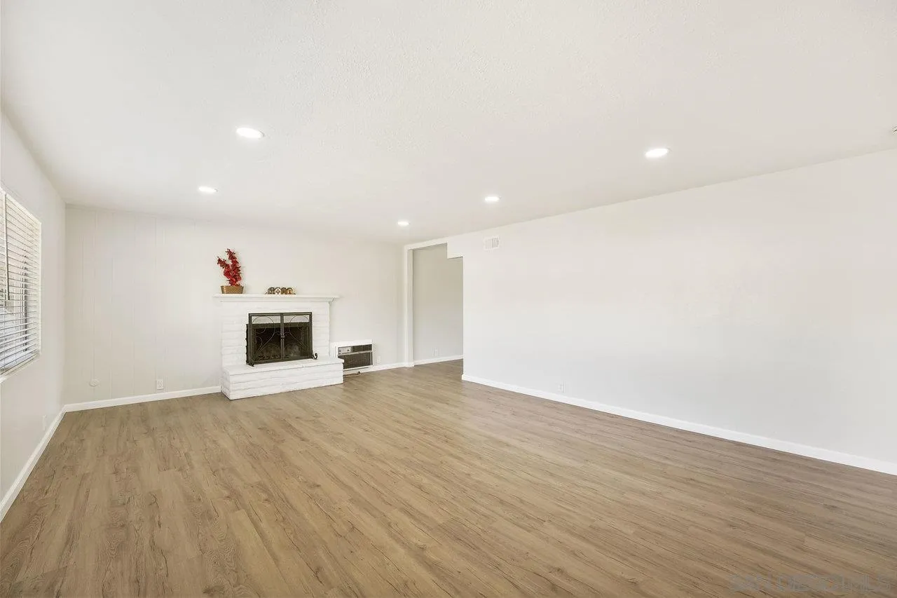 1355 Bluebell Way El Cajon, CA 92021 - Photo 5 of 33 a view of a room with wooden floor and window
