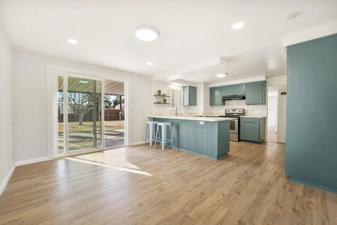 1355 Bluebell Way El Cajon, CA 92021 - Photo 9 of 33 a view of kitchen with wooden floor and window