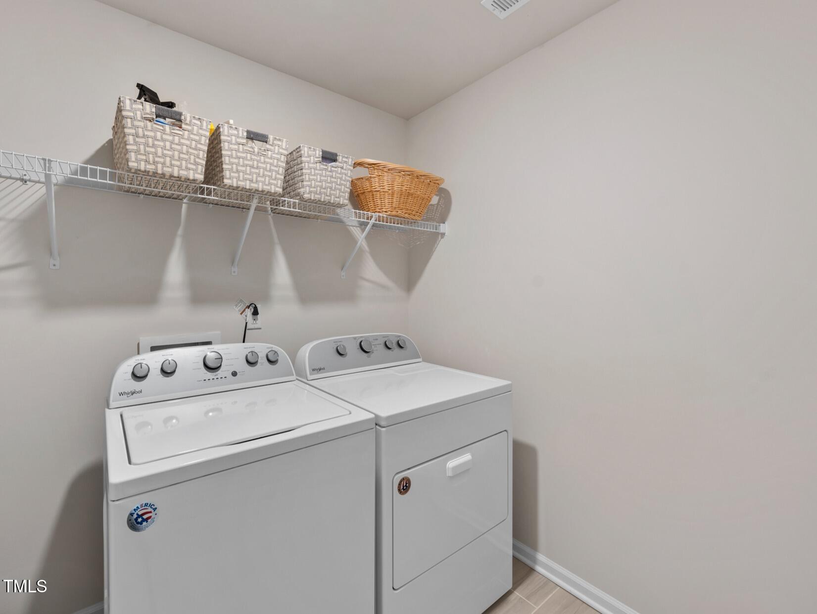 3408 Dropseed Drive Apex, NC 27502 - Photo 26 of 27 a utility room with dryer and washer