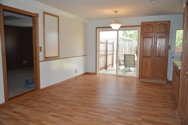 7 East Oltendorf Road Streamwood, IL 60107 - Photo 6 of 17 a view of empty room with wooden floor and fan