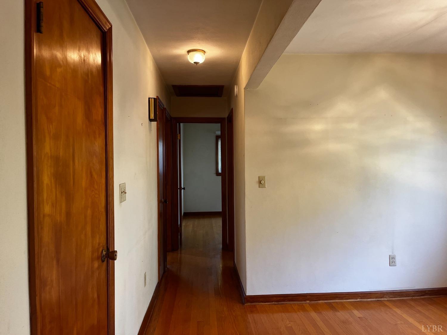 1089 Howell Ridge Lane Vinton, VA 24179 - Photo 11 of 39 a view of a hallway with wooden floor