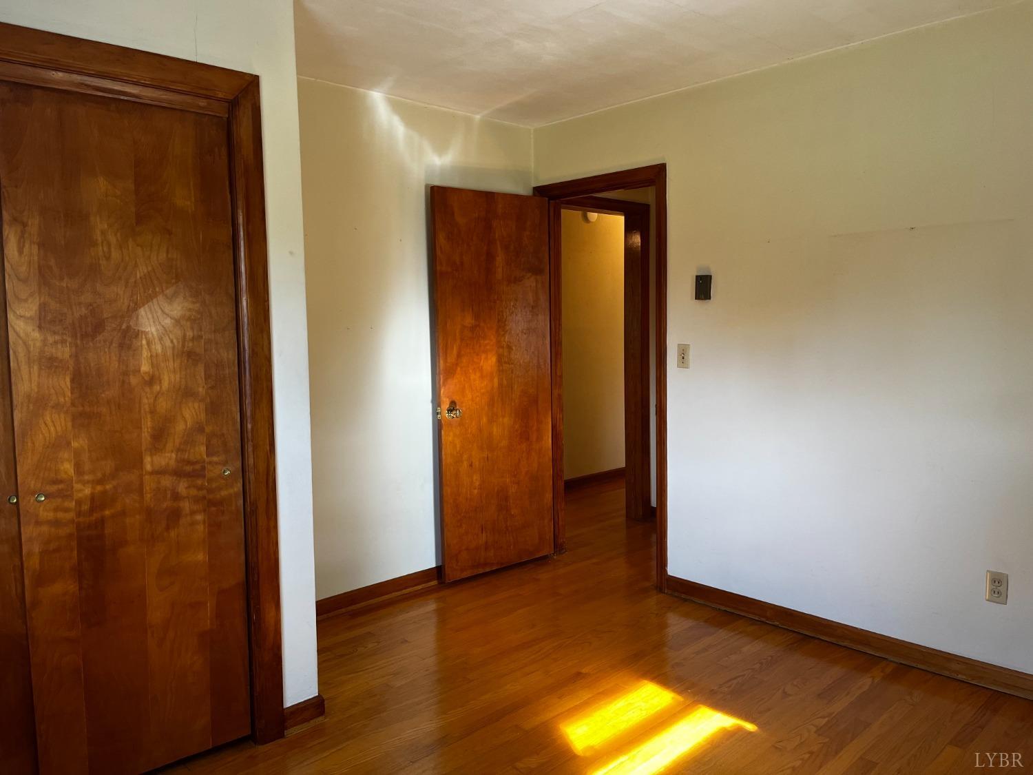 1089 Howell Ridge Lane Vinton, VA 24179 - Photo 17 of 39 an empty room with closet area
