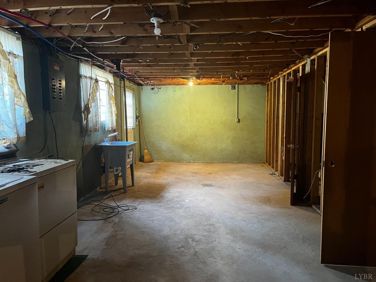 1089 Howell Ridge Lane Vinton, VA 24179 - Photo 20 of 39 a view of empty room with wooden walls