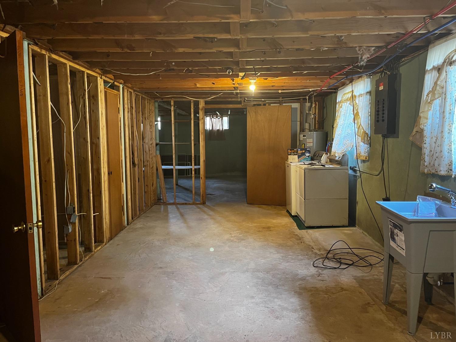 1089 Howell Ridge Lane Vinton, VA 24179 - Photo 21 of 39 a view of an empty room with furniture and a window