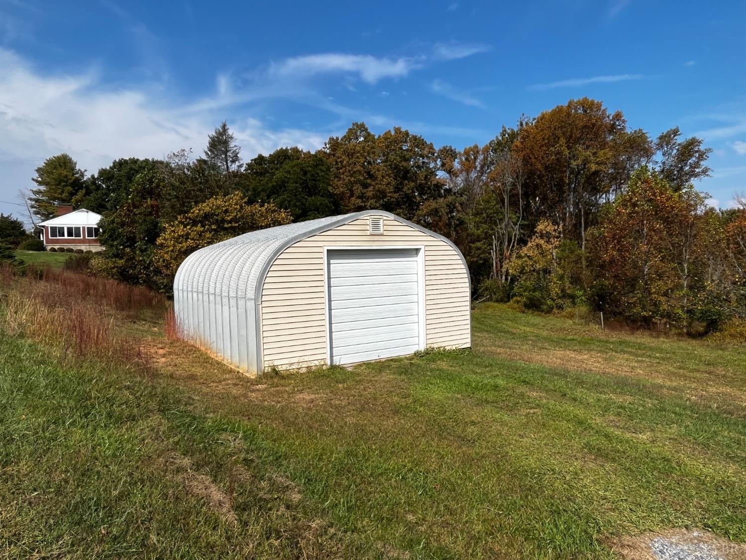 1089 Howell Ridge Lane Vinton, VA 24179 - Photo 25 of 39 a view of a house with a yard and mountain view