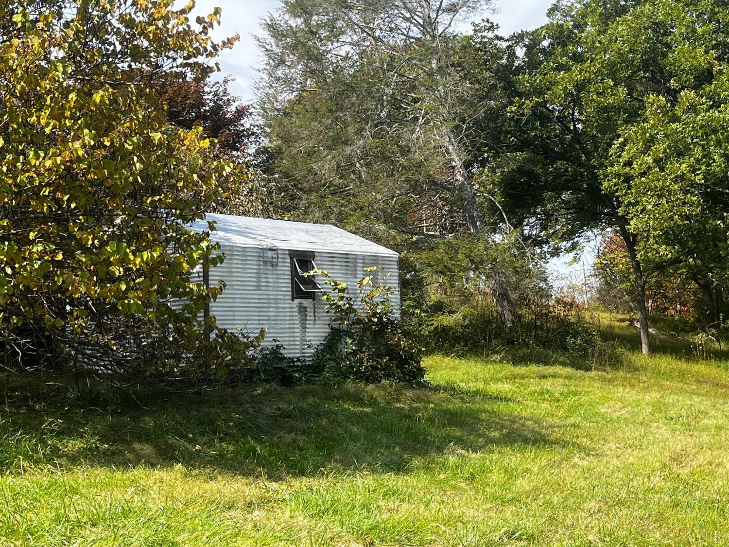 1089 Howell Ridge Lane Vinton, VA 24179 - Photo 27 of 39 a backyard of a house with lots of green space