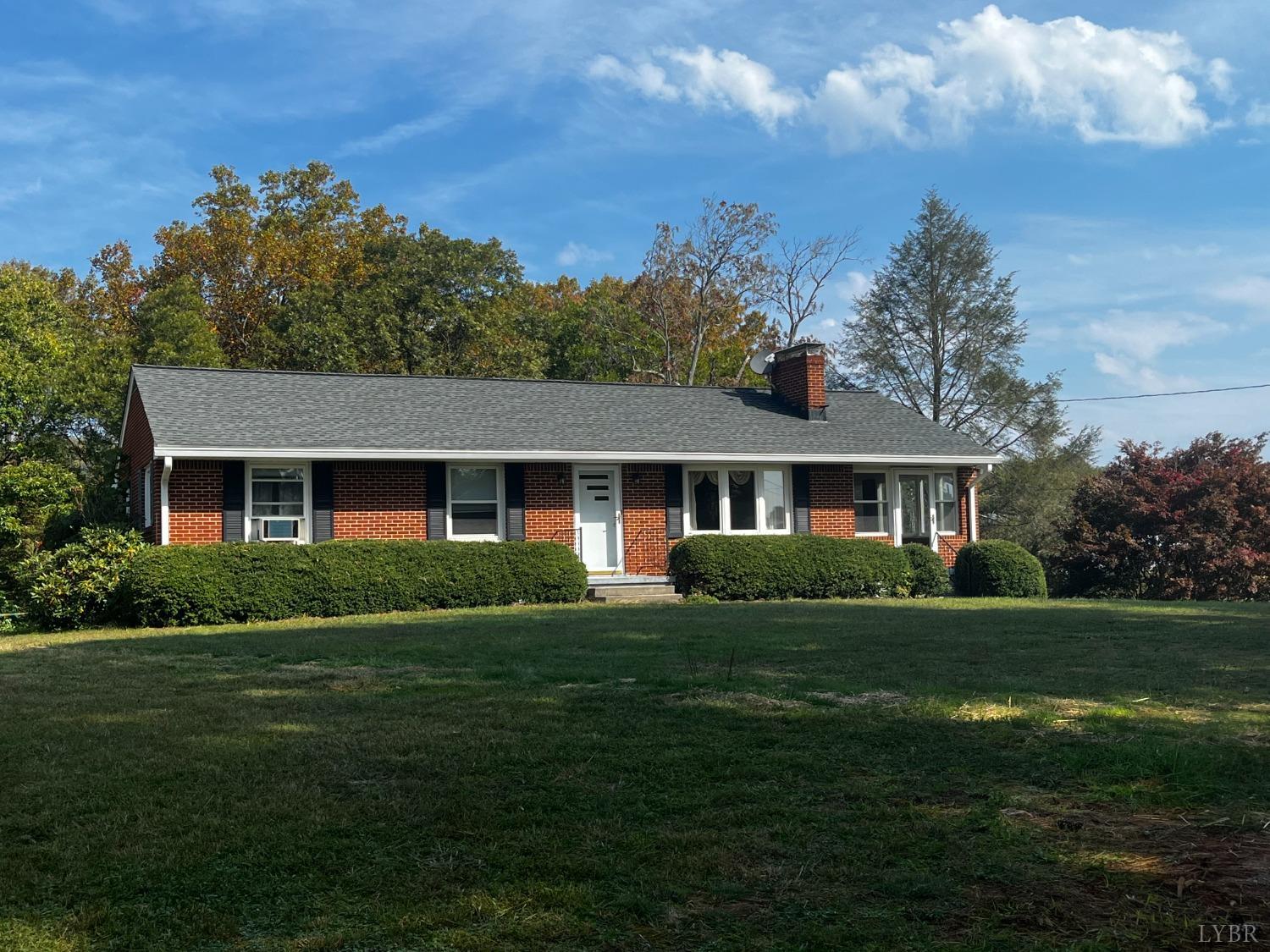 1089 Howell Ridge Lane Vinton, VA 24179 - Photo 39 of 39 a front view of a house with a garden