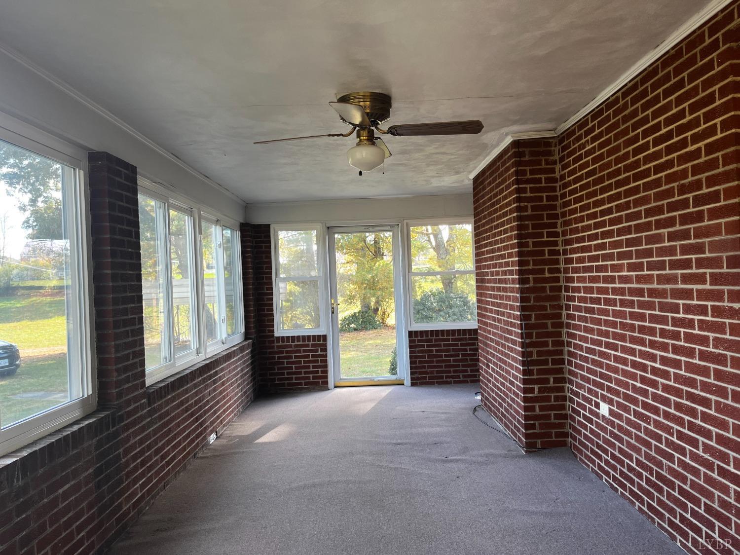 1089 Howell Ridge Lane Vinton, VA 24179 - Photo 8 of 39 a view of an empty room with a window