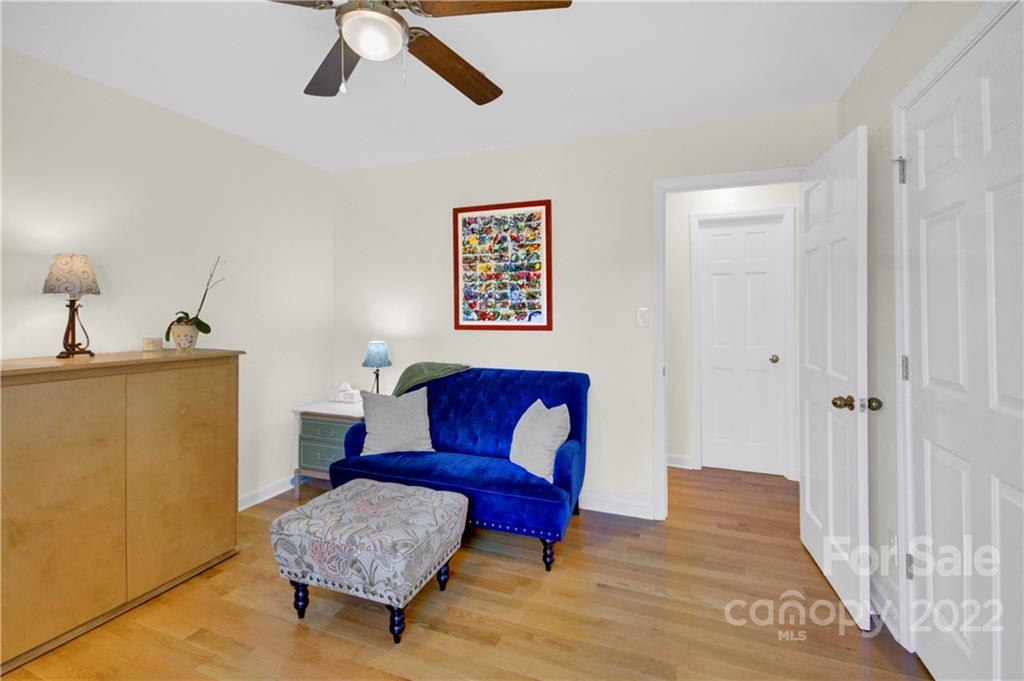 4063 Lake Shore Road South Denver, NC 28037 - Photo 29 of 47 a living room with furniture and a rug