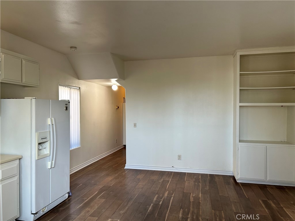 212 Rochester Avenue Huntington Beach, CA 92648 - Photo 4 of 10 Living space with built in shelves