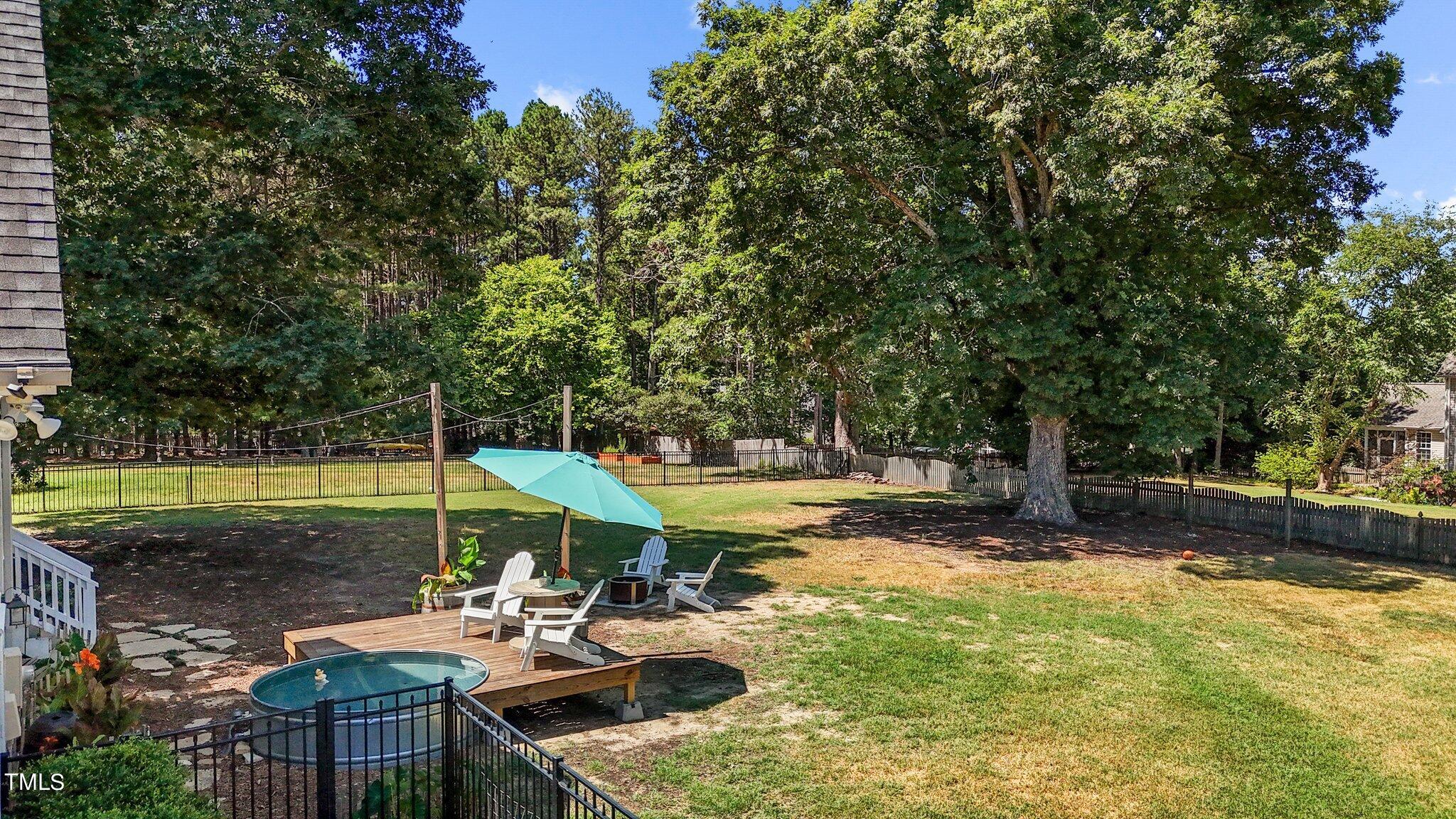 1917 Wheelerbrook Court Raleigh, NC 27603 - Photo 12 of 49 7-web-or-mls-DJI_20240702112658_0510_D