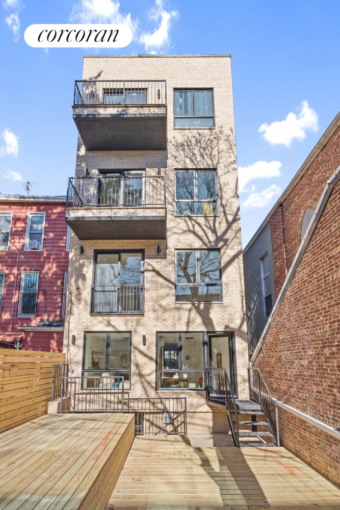 1198 Jefferson Avenue, Unit C Brooklyn, NY 11221 - Photo 10 of 24 a view of a building with sitting area