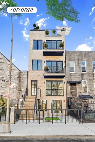a view of a building with sitting area