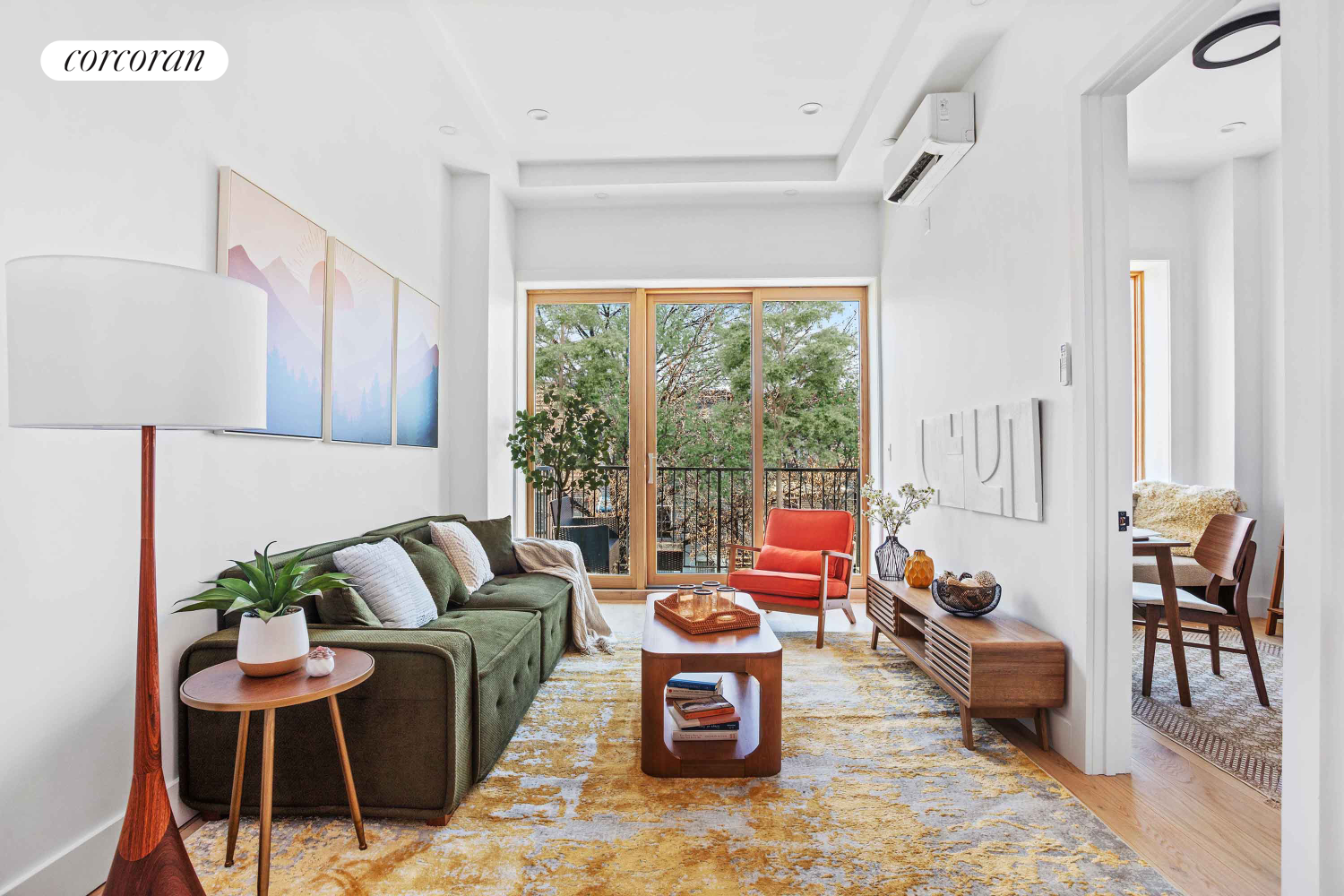 1198 Jefferson Avenue, Unit C Brooklyn, NY 11221 - Photo 12 of 24 a living room with furniture and a large window