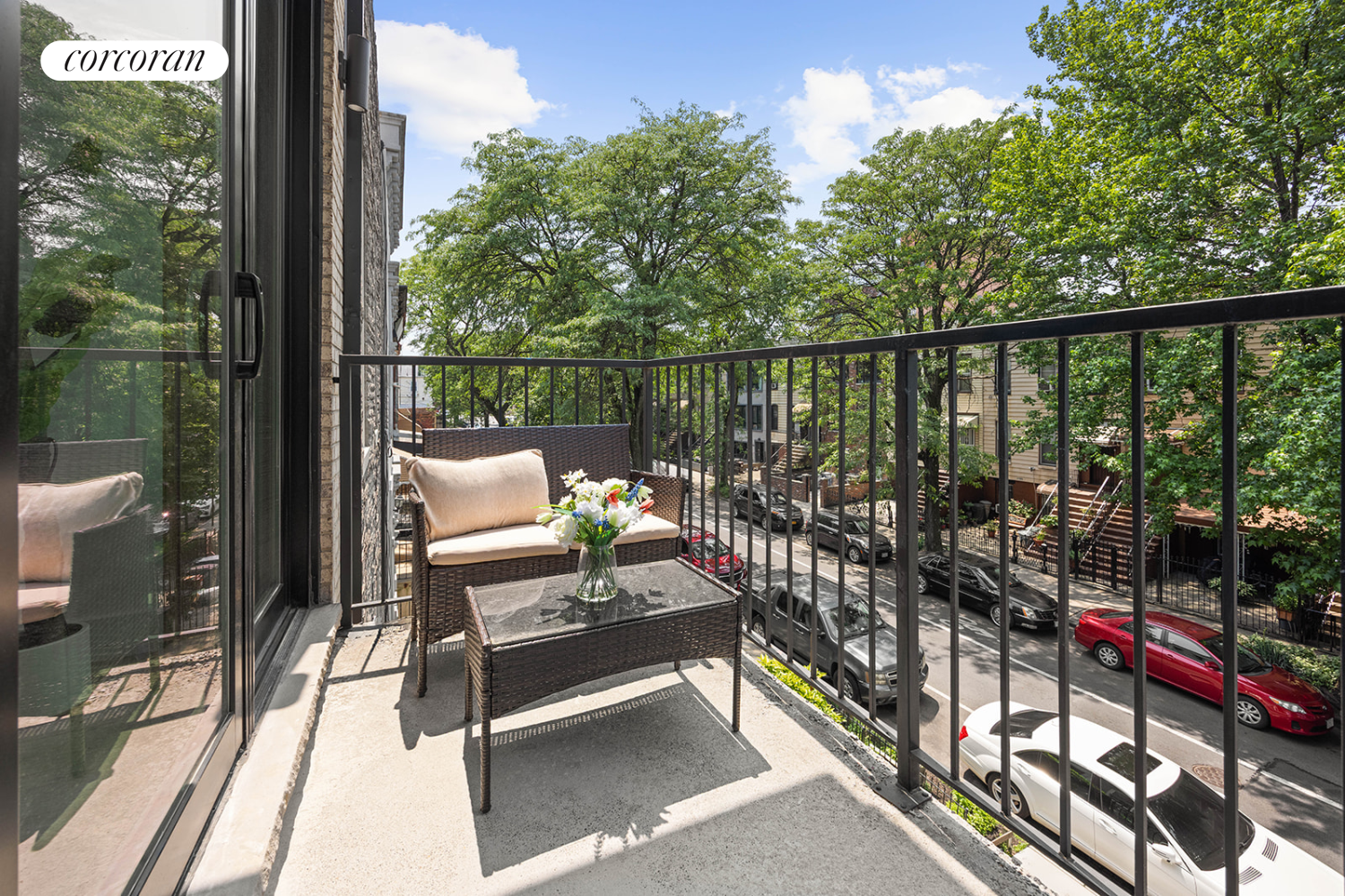 1198 Jefferson Avenue, Unit C Brooklyn, NY 11221 - Photo 4 of 24 a view of a balcony with chairs and wooden floor
