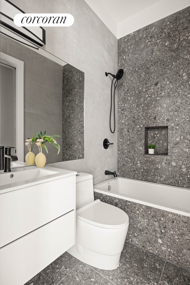 1198 Jefferson Avenue, Unit C Brooklyn, NY 11221 - Photo 8 of 24 a bathroom with a sink a toilet and shower