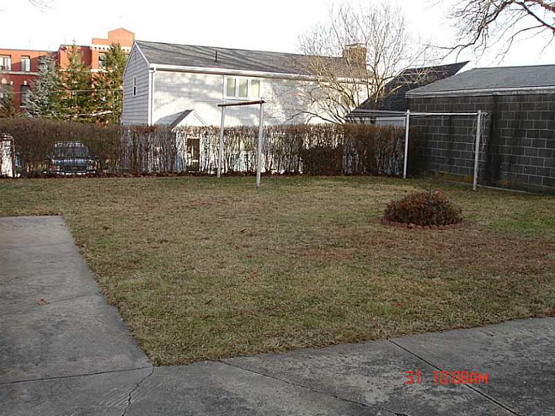 102 Monroe Street Woonsocket, RI 02895 - Photo 13 of 18 Yard/Garden. Spacious back yard.