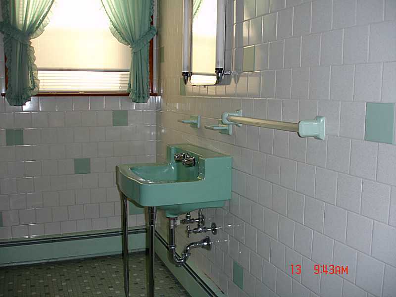 102 Monroe Street Woonsocket, RI 02895 - Photo 10 of 18 Bathroom. All tiled bath and shower.