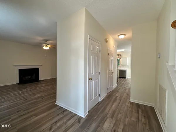 a view of balcony with wooden floor and fence