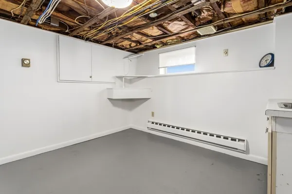 a bathroom with a sink and vanity