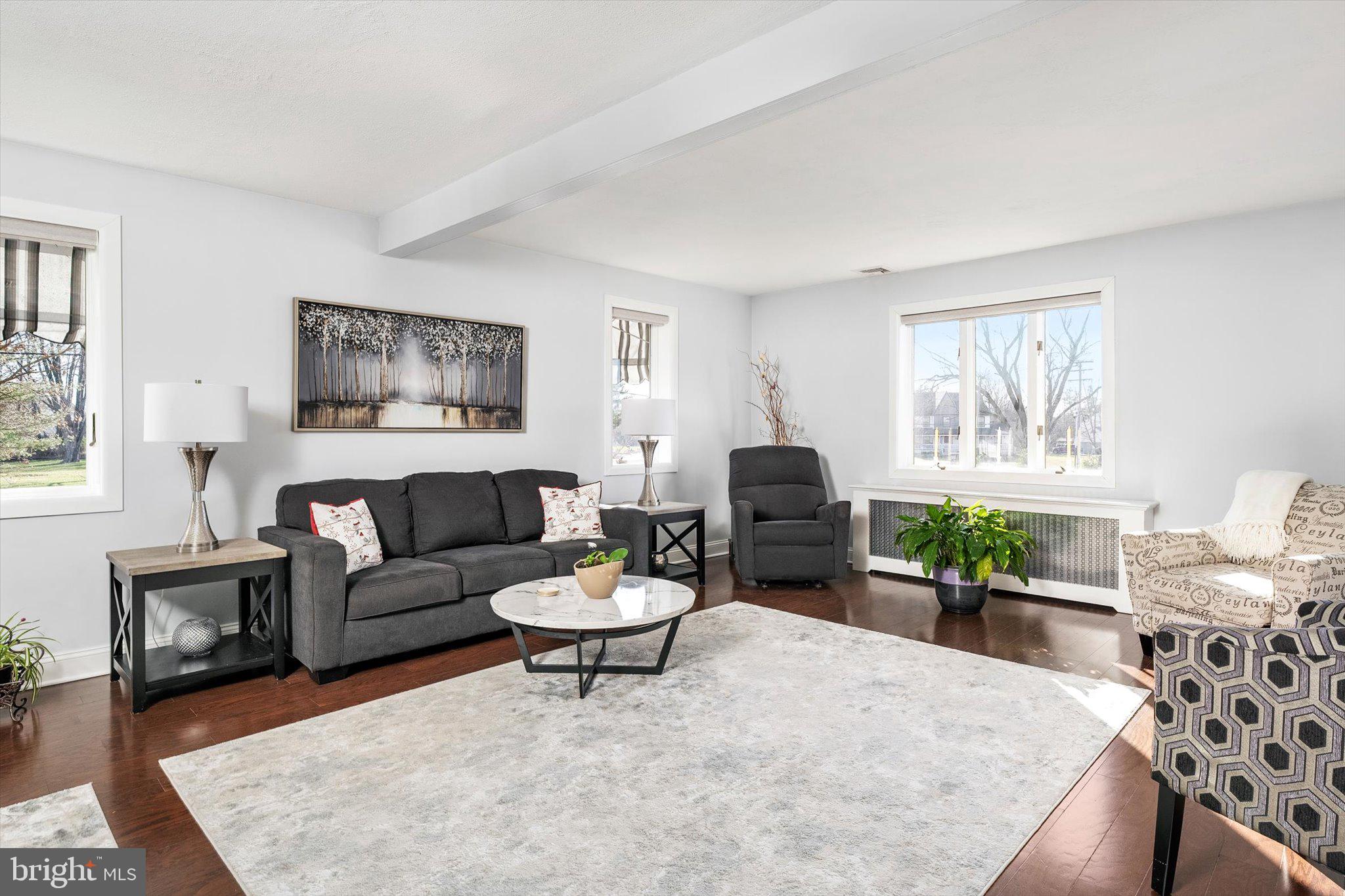 151 Walnford Road Allentown, NJ 08501 - Photo 3 of 48 a living room with furniture and a potted plant