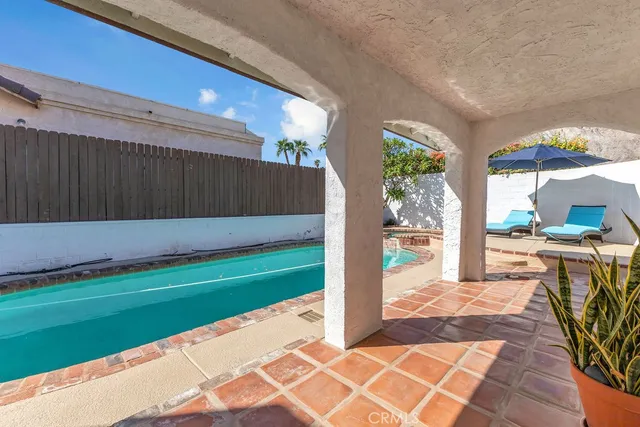 a view of a back yard from a patio