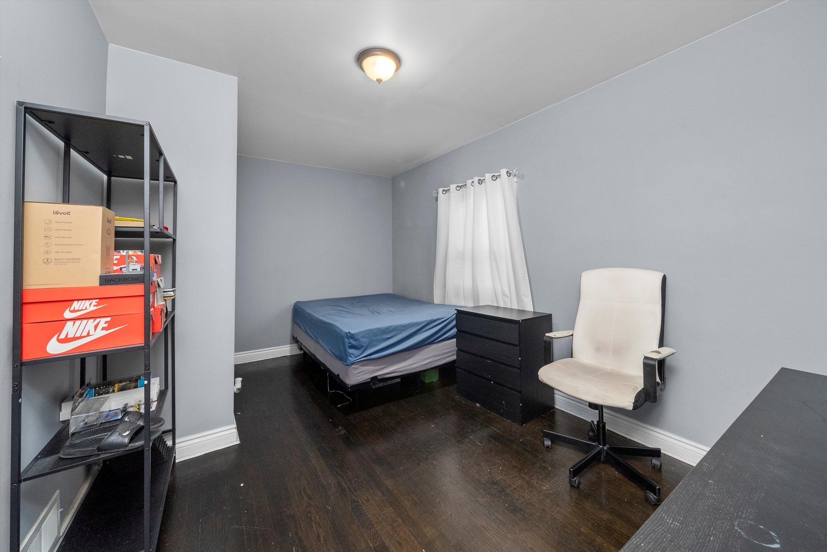 5837 West 16th Street Cicero, IL 60804 - Photo 11 of 22 a living room with furniture and a flat screen tv