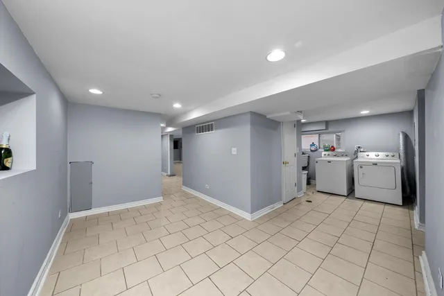 a view of a kitchen with microwave and cabinets