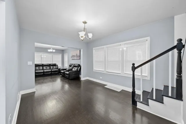 a view of a livingroom with furniture a fireplace
