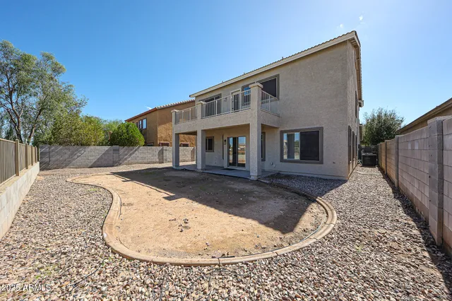 a view of a balcony with an ocean view