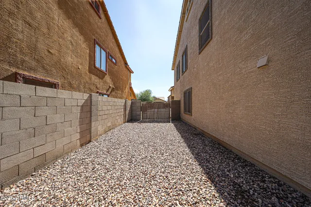 a view of a pathway both side of building