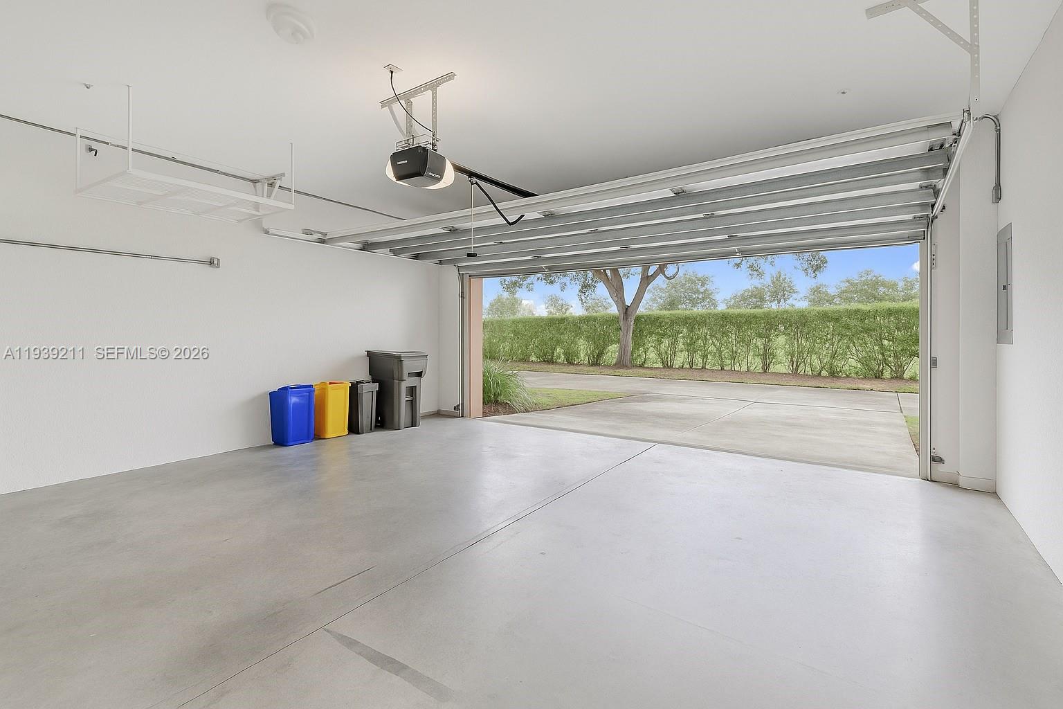 4581 Danson Way Delray Beach, FL 33445 - Photo 18 of 19 a view of a livingroom with wooden floor and a fireplace