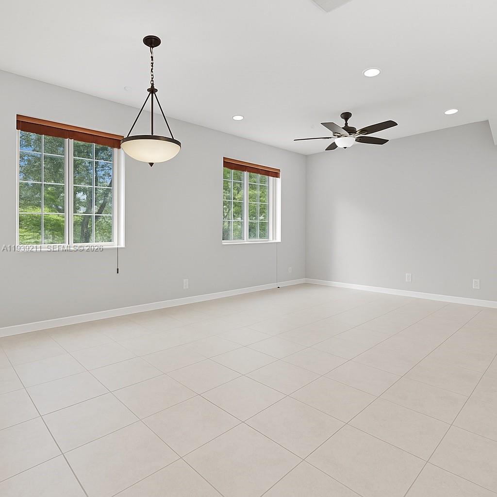 4581 Danson Way Delray Beach, FL 33445 - Photo 4 of 19 a view of an empty room with a window