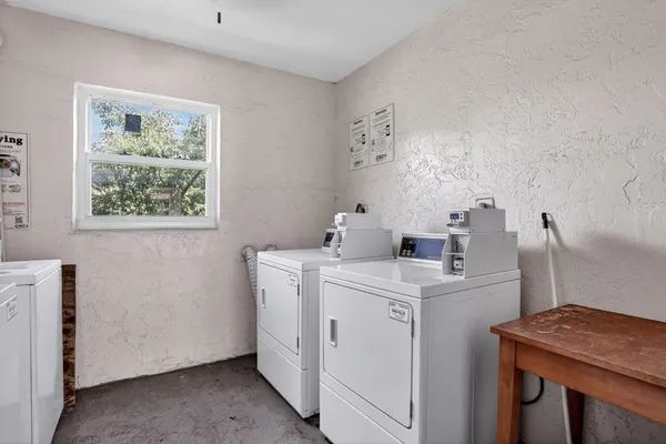 a view of storage and utility room with a sink
