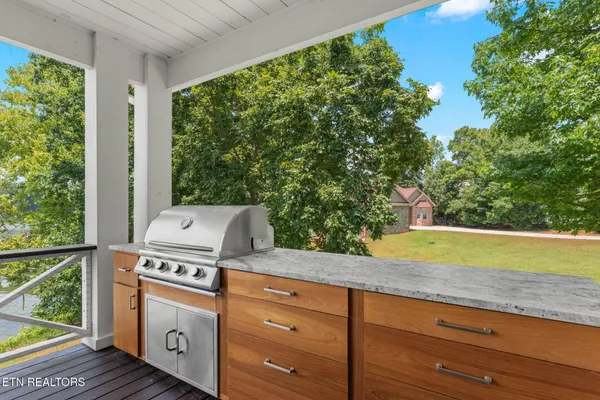 a dining room with furniture window and outside view
