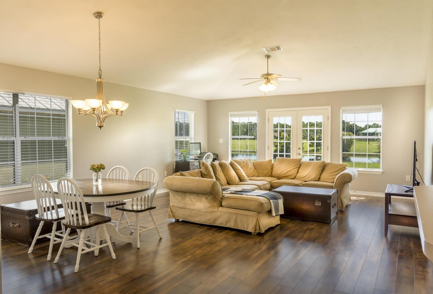 235 South Harborview Road Santa Rosa Beach, FL 32459 - Photo 4 of 12 a living room with furniture and a large window