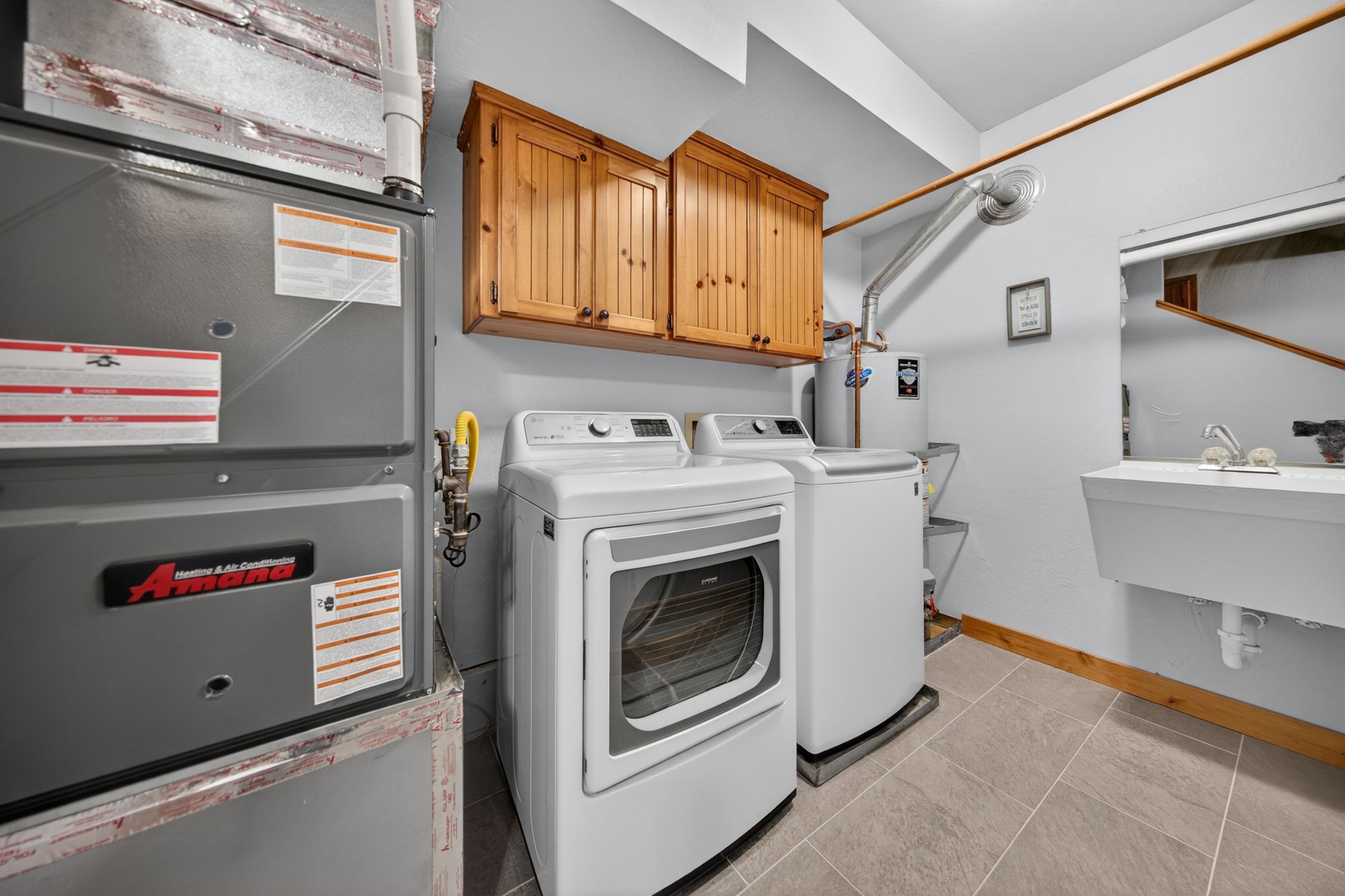 1220 Lynx Road Lake Almanor, CA 96137 - Photo 34 of 45 a utility room with dryer and washer