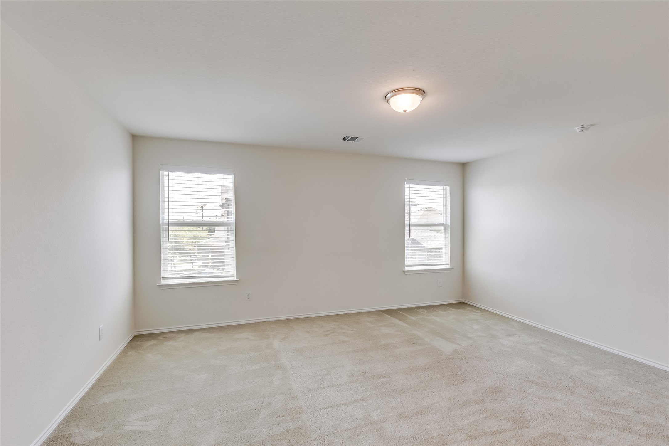 2007 Fretboard Street Round Rock, TX 78664 - Photo 22 of 40 an empty room with windows