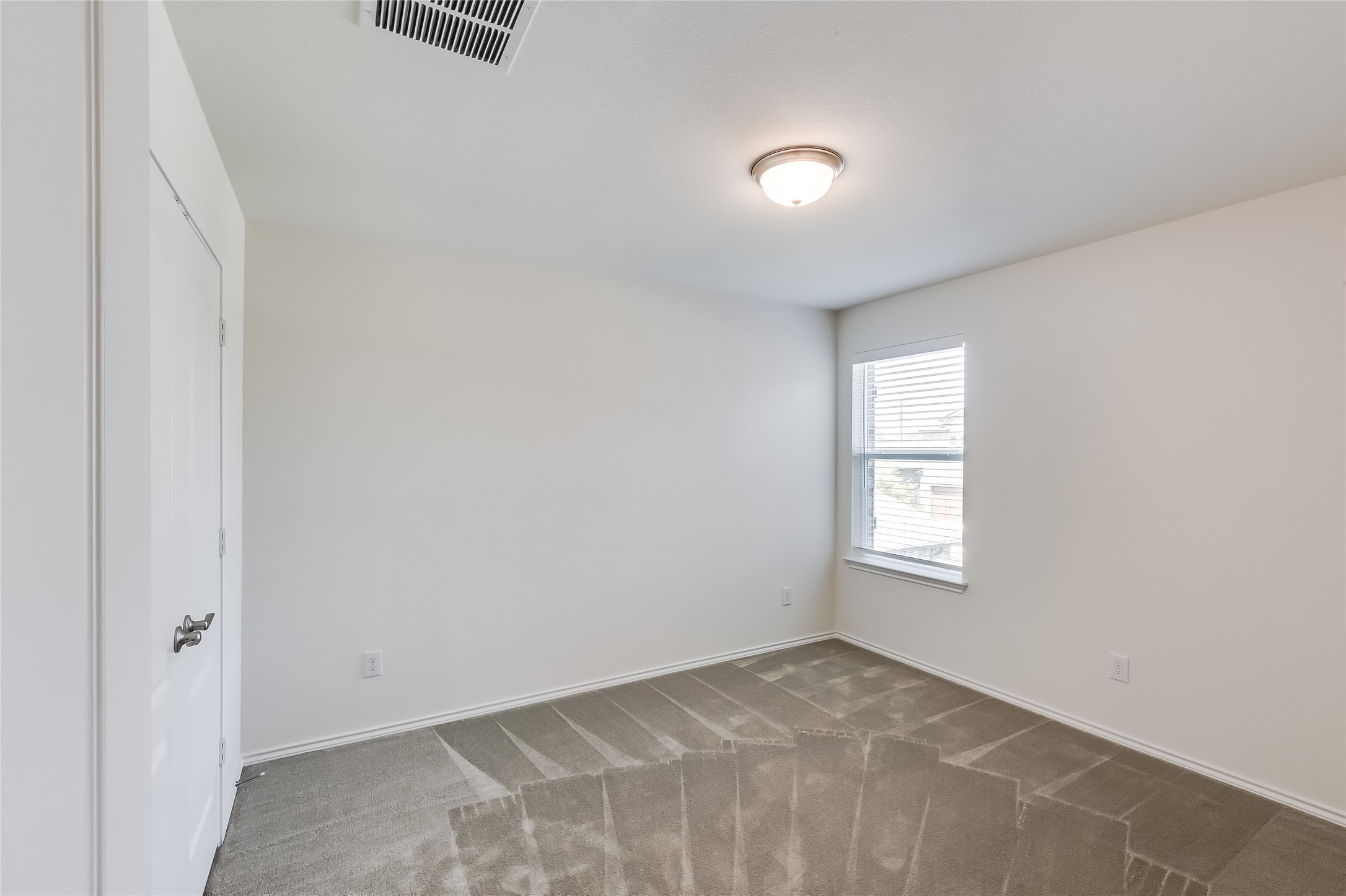 2007 Fretboard Street Round Rock, TX 78664 - Photo 26 of 40 a view of an empty room with a window