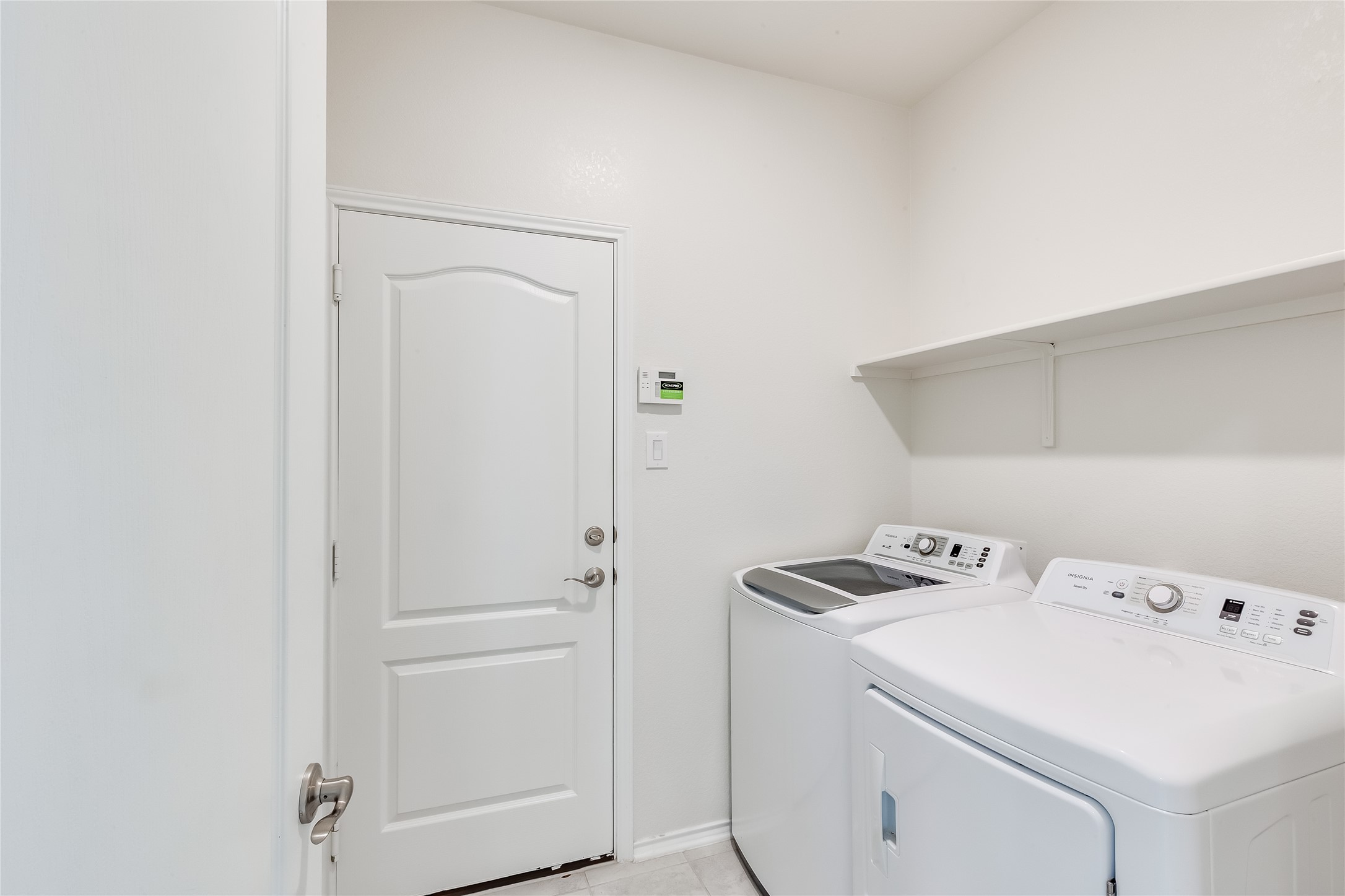 2007 Fretboard Street Round Rock, TX 78664 - Photo 29 of 40 a view of storage and utility room with washer and dryer