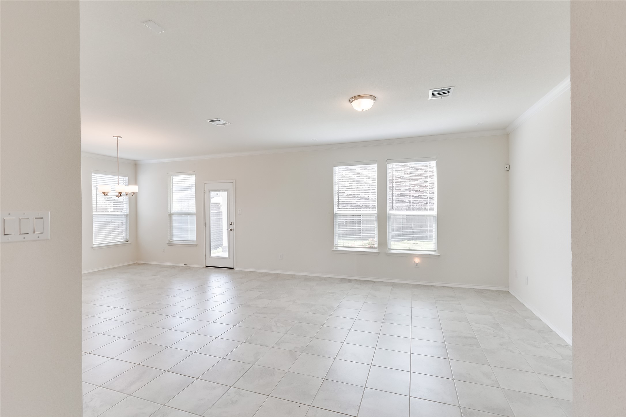 2007 Fretboard Street Round Rock, TX 78664 - Photo 5 of 40 a view of an empty room with a window