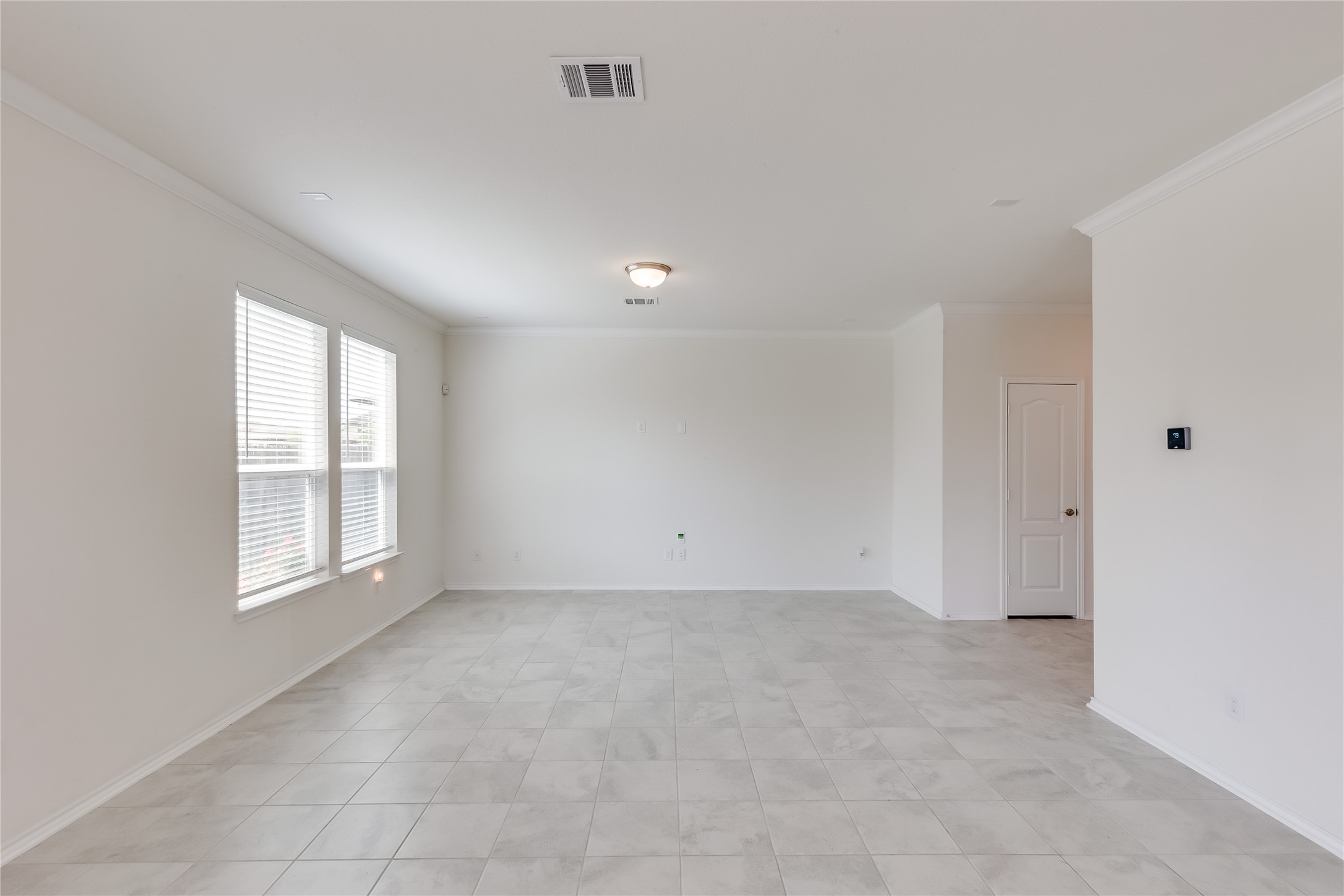 2007 Fretboard Street Round Rock, TX 78664 - Photo 8 of 40 a view of an empty room with a window