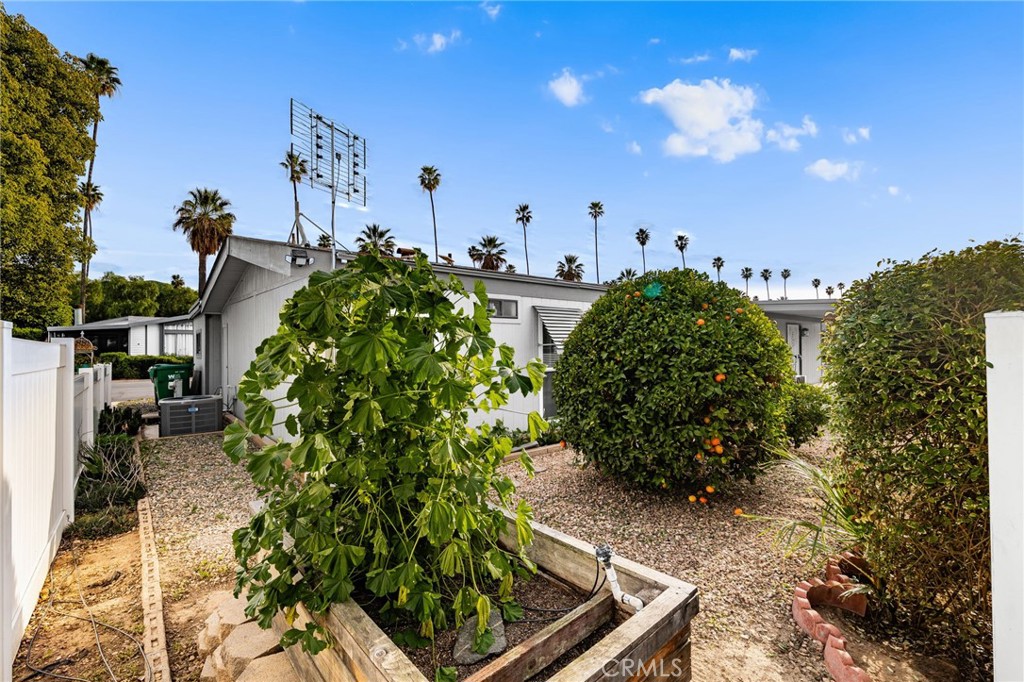13381 Magnolia, Unit 35 Corona, CA 92879 - Photo 22 of 39 a view of a garden with an outdoor seating