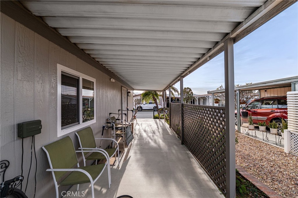13381 Magnolia, Unit 35 Corona, CA 92879 - Photo 26 of 39 a view of a balcony with chairs