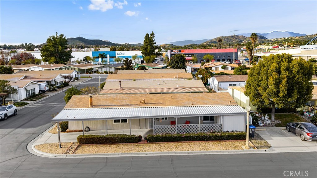 13381 Magnolia, Unit 35 Corona, CA 92879 - Photo 31 of 39 a view of a building with outdoor space
