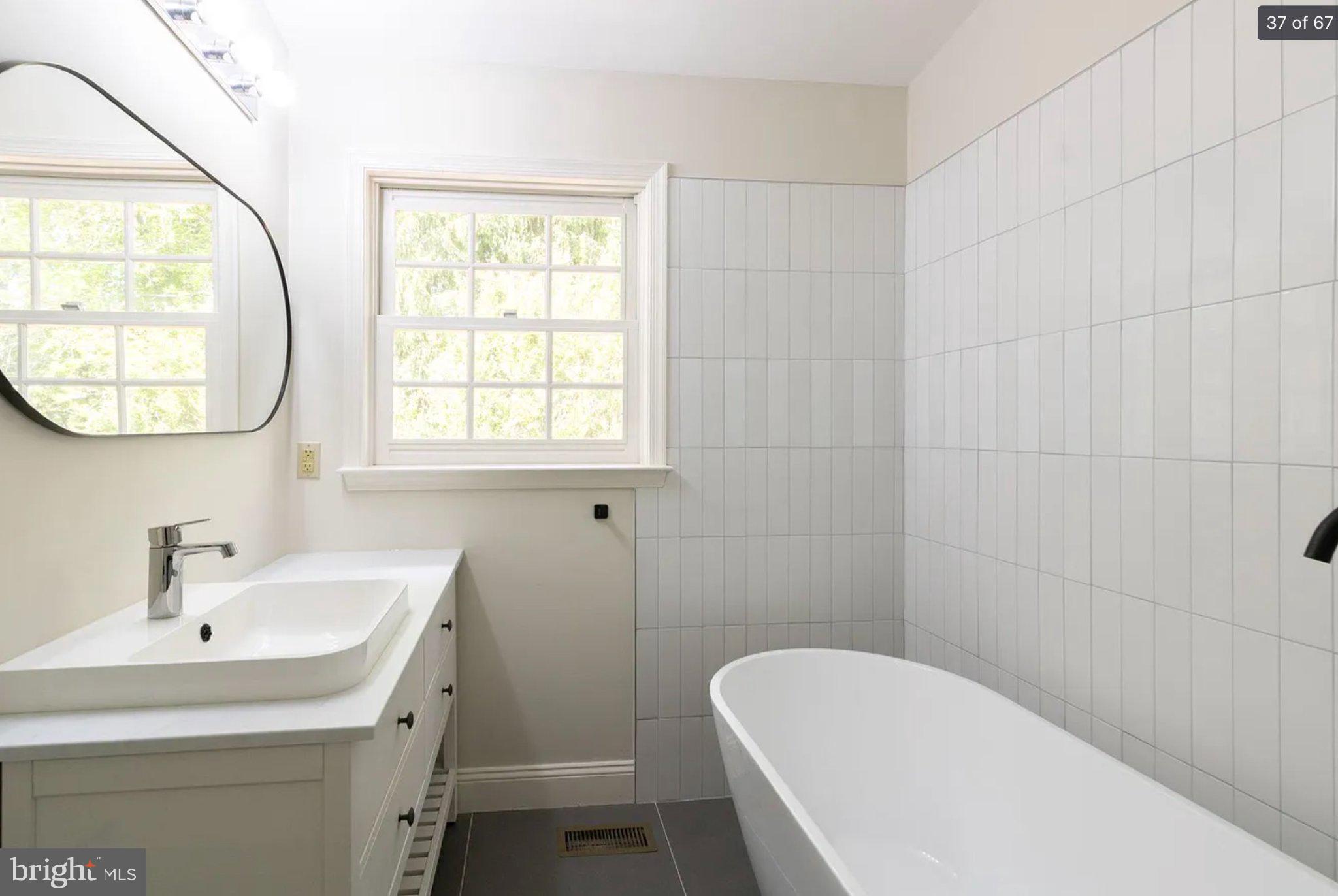 3906 Valley Ridge Drive Fairfax, VA 22033 - Photo 38 of 58 Serene bathroom with natural light.