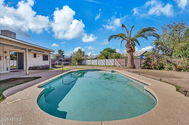 a room with furniture and a wooden floor