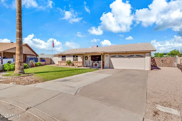 a view of a house with a street