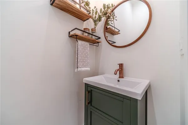 a white bath tub sitting in a bathroom